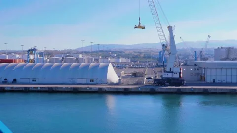 Crane at port ready to load cargo containers. Harbor cranes. 4k Stock Footage 139625274
