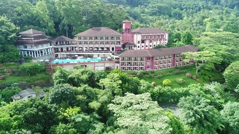 Crane Pull Out Of Hotel In A Hill Country Countryside, Aerial 4K Stock Footage 96775205