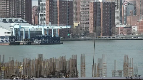 Crane pulling cables on a construction site in New York Stock Footage 241451341