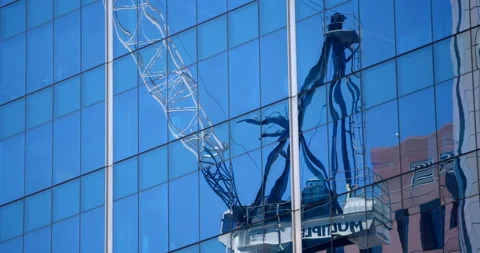 Crane reflection in skyscraper Stock Footage 137534594