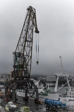Crane in the seaport. Stock Photos