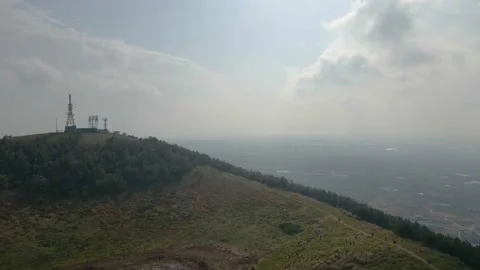 Crane Shot Aerial View of the Summit of Geum Oreum, Jeju, South Korea. Stock Footage 146066646