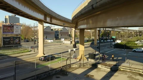 Crane Shot of CTA Train Departing Urban Neighborhood [4K] Stock Footage 107112271