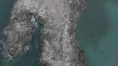 Crane shot with a drone at Dragon's Teeth point in Kapalua Maui Hawaii Stock Footage 133020297