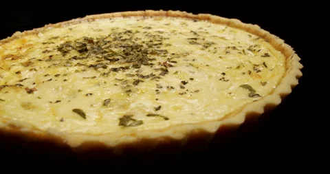 Crane shot floating over Delicious Cheese Pie Dish, Quiche Meal, Turning Around Stock Footage 242433045