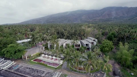 Crane shot, of a front beach luxury hotel in Tejakula, North Bali, Indonesia Stock Footage 235010581