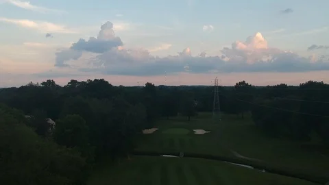 Crane shot of a golf course during sunset 库存影片 113478861