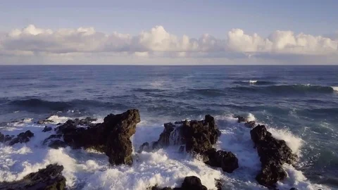 Crane Shot Of Powerful Ocean Waves Hitting A Rocky Coastline Stock Footage 85143322