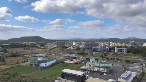 Crane Shot of A Seaside Town on Eastern Shore of Jeju Volcanic Island. Stock Footage 146066932