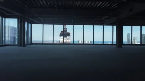 Crane shot toward floor to ceiling windows Stock Footage 178187476