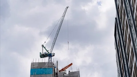 Crane in Sky. Construction Time lapse. Construction of Skyscraper. Stock Footage 113597243