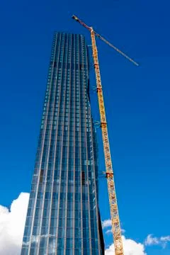 Crane on skyscraper building site Stock Photos