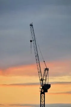 Crane at sunset Stock Photos