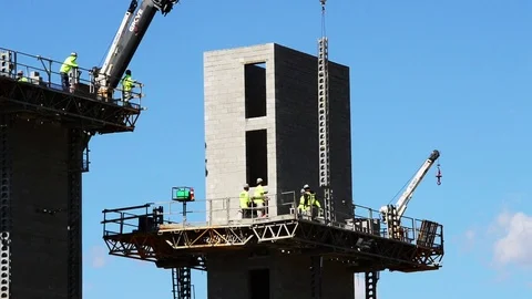 Crane takes ladder off elevator tower Video stock 73777266