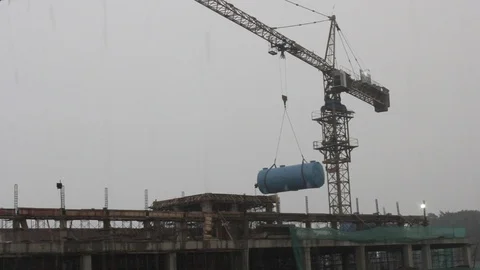 Crane Tower Lifting Big Tank Stock Footage 118348938