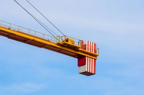 Crane tower on sky background at construction site Stock Photos