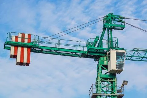 Crane tower on sky background at construction site Stock Photos