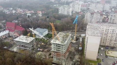 Crane tower working View from the quadcopter Stock Footage 145185888