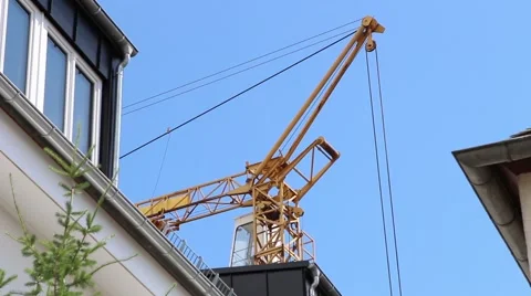 Crane transporting container with ground Stock Footage 64225951