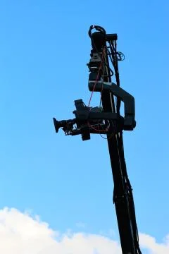 Crane with tv camera Stock Photos