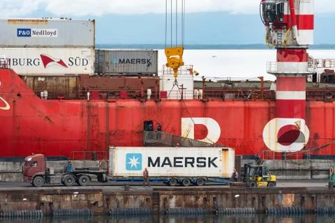 Crane unloading container cargo ship Sevmorput Rosatomflot - Russian nuclear Stock Photos
