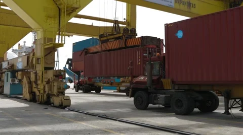 Crane Unloading Containers In Port Stock Footage 61737720