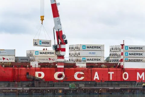 Crane unloading Russian container ship Sevmorput - nuclear-powered icebreaker Stock Photos