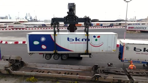 Crane Unloads bkm Trailer from Rail Wagon Port Stock Footage 338371678