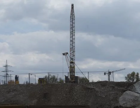 Crane vehicle in the construction work Stock Photos