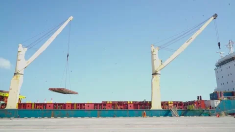 Crane Vessel Ship Crane Removing Cargo Hatch Covers Video stock 255201786