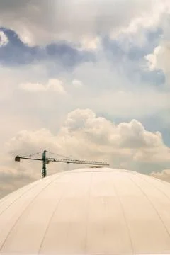 Crane work behind the dome. Stock Photos