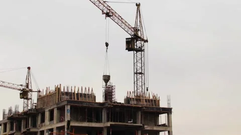 Crane work on cloudy day Stock Footage