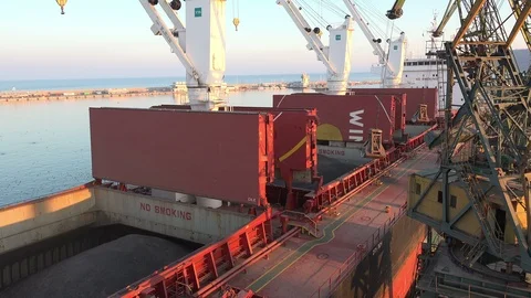 A crane at work at seaport Stock Footage 85560504