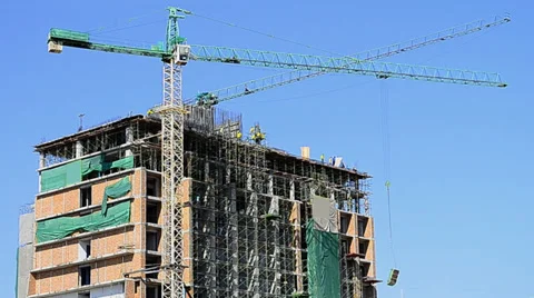 Crane working in big construction site Stock Footage 34692650