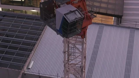 Crane working at building construction site at dusk Video stock 328131865