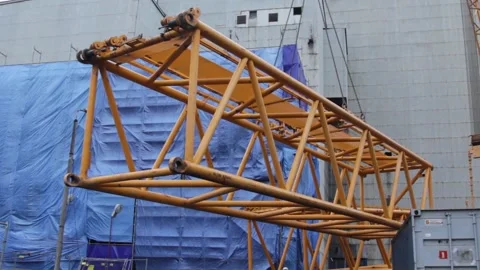 Crane working at the construction site of the coal-fired power station Stock Footage 137574105