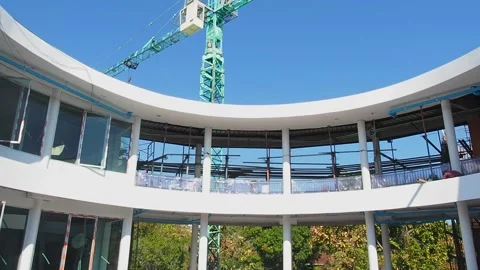 Crane working on construction site. Construction site with crane and building. Stock Footage 197066760