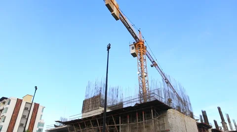 Crane working in construction site Stock Footage 53865449