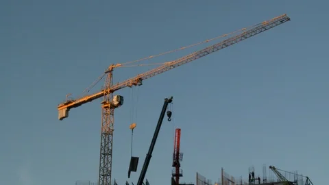 Crane working at a construction site Stock Footage 88450702
