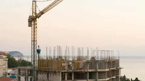 Crane working in construction site Stock Footage 98476619