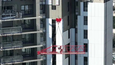 Crane working in a construction site Stock Footage 228076184