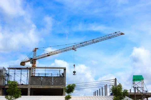 Crane working on construction site Stock Photos