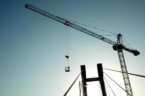 Crane working at Construction site Stock Photos