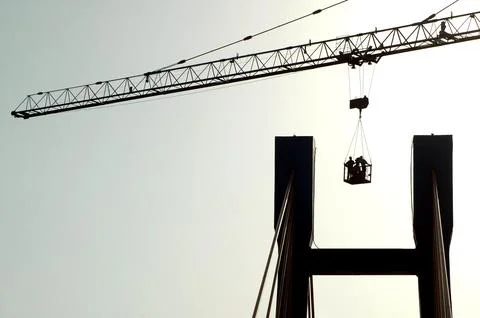 Crane working at Construction site Stock Photos