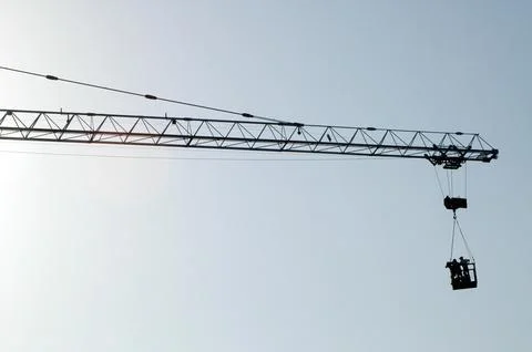 Crane working at Construction site Stock Photos