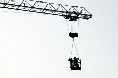 Crane working at Construction site Stock Photos
