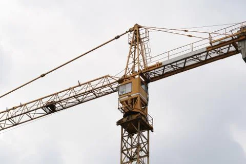 Crane working at contruction site Stock Photos
