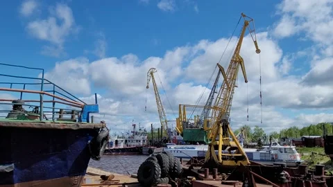 Crane working on the river pier Stock Footage 197054341