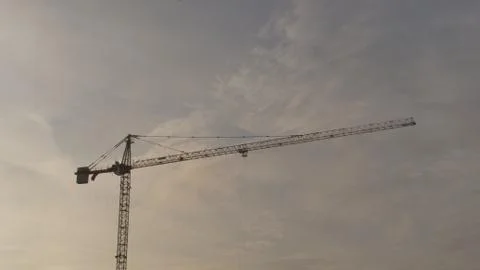 Crane Working At Sunset Stock Photos