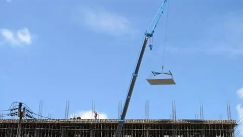 Crane working on tower in construct site and blue sky Stock Footage 98247830